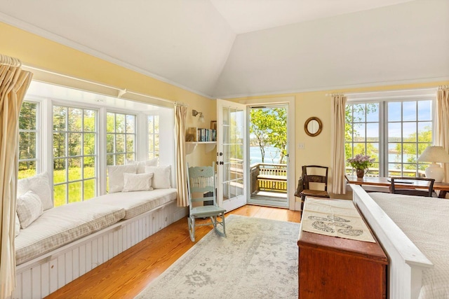1392 N Haven Rd, Vinalhaven, ME 04863 - bedroom featuring access to exterior, wood finished floors, lofted ceiling, a water view, and ornamental molding