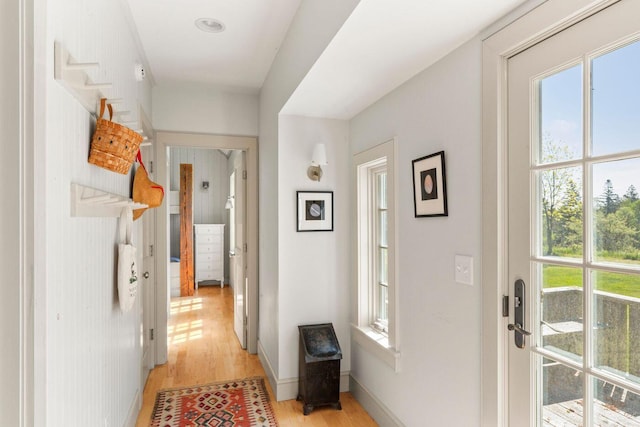 1392 N Haven Rd, Vinalhaven, ME 04863 - hallway featuring healthy amount of natural light and light wood-style flooring
