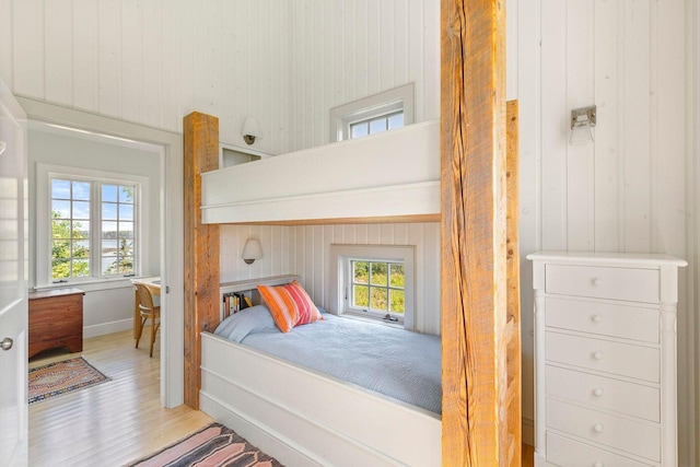 1392 N Haven Rd, Vinalhaven, ME 04863 - bedroom featuring wooden walls and wood finished floors