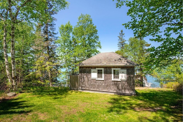 1392 N Haven Rd, Vinalhaven, ME 04863 - view of side of property featuring a yard and an outbuilding