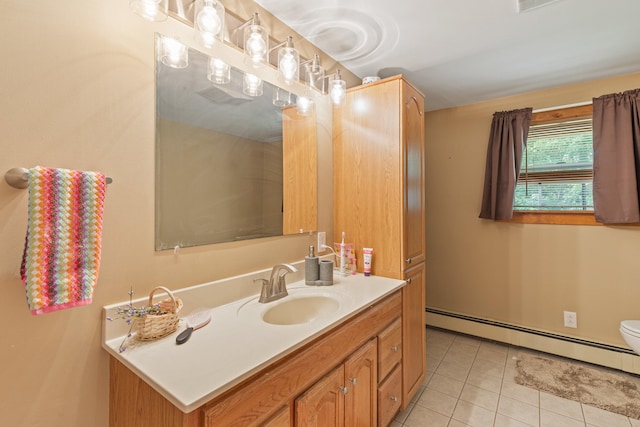 324 Pleasant Pond Rd, Turner, ME 04282 - bathroom with a baseboard heating unit, vanity, and tile patterned flooring