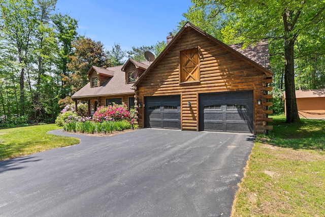 324 Pleasant Pond Rd, Turner, ME 04282 - log-style house with driveway, log exterior, a chimney, and a front yard