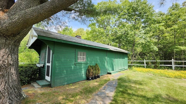36 Dunning Blvd, Bangor, ME 04401 - view of home's exterior featuring a chimney and an outbuilding