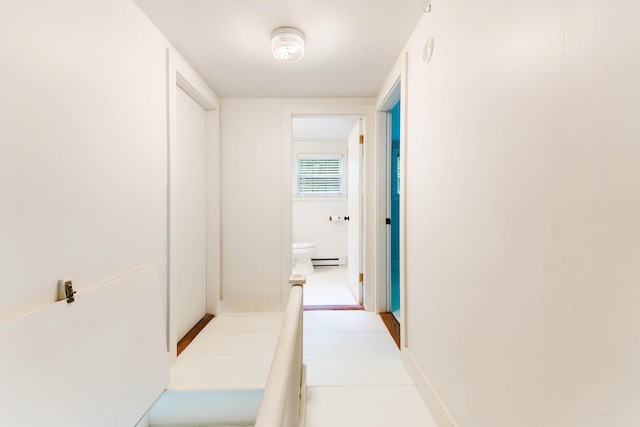 419 River Rd, Newcastle, ME 04553 - hallway featuring baseboards and a baseboard radiator