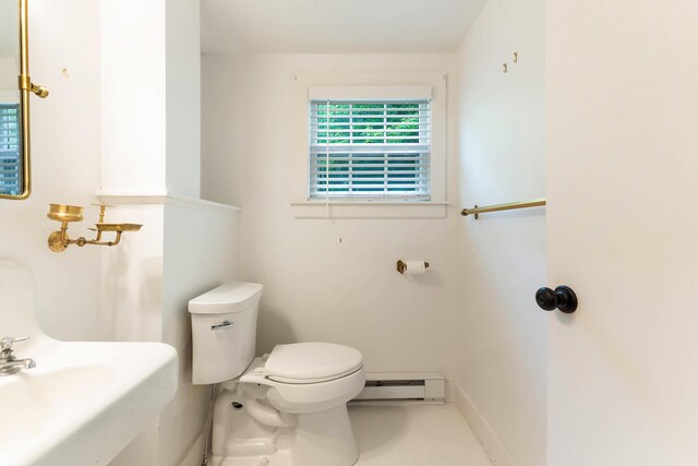 419 River Rd, Newcastle, ME 04553 - bathroom with a baseboard heating unit and toilet