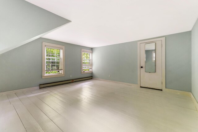 419 River Rd, Newcastle, ME 04553 - spare room featuring baseboard heating and wood finished floors