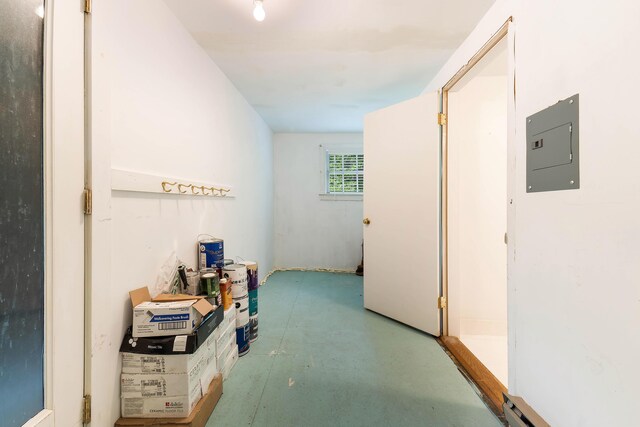 419 River Rd, Newcastle, ME 04553 - corridor featuring electric panel and finished concrete flooring