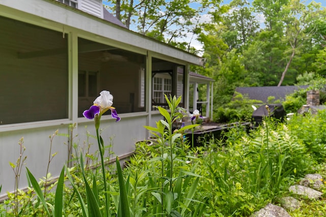 419 River Rd, Newcastle, ME 04553 - view of patio featuring a sunroom