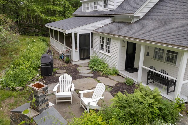 419 River Rd, Newcastle, ME 04553 - view of patio with a sunroom