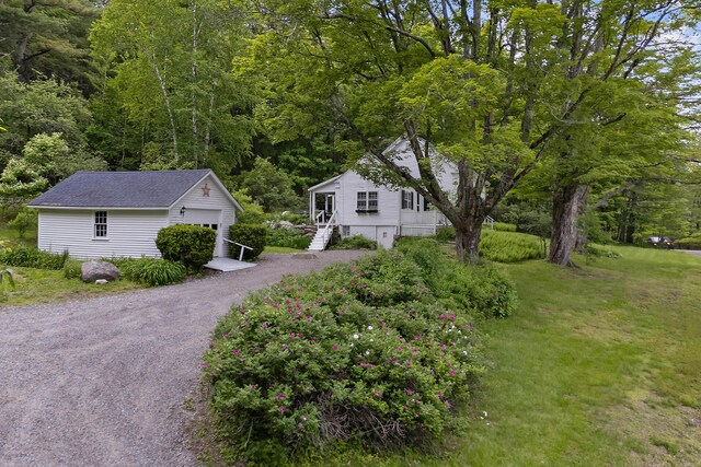 419 River Rd, Newcastle, ME 04553 - view of front of home with an outbuilding and gravel driveway