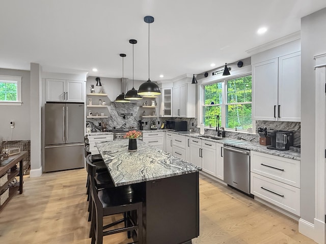 132 Mineral Spring Rd Unit 1, Windham, ME 04062 - kitchen with stainless steel appliances, open shelves, tasteful backsplash, and recessed lighting