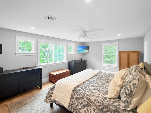 132 Mineral Spring Rd Unit 1, Windham, ME 04062 - bedroom featuring multiple windows, wood finished floors, ceiling fan, and recessed lighting