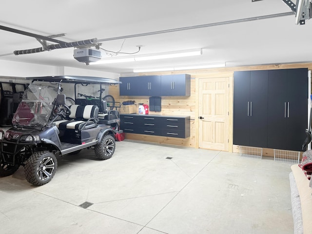 132 Mineral Spring Rd Unit 1, Windham, ME 04062 - garage featuring a garage door opener