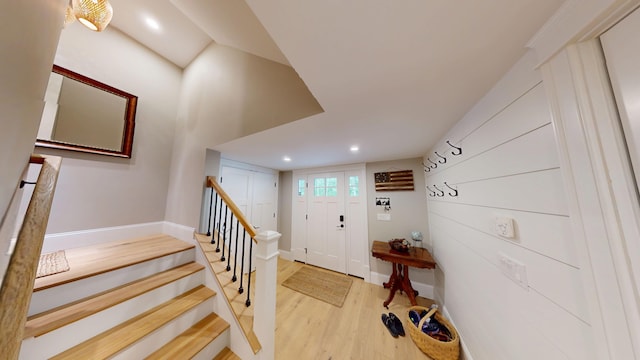132 Mineral Spring Rd Unit 1, Windham, ME 04062 - entrance foyer with light wood finished floors, stairs, and recessed lighting