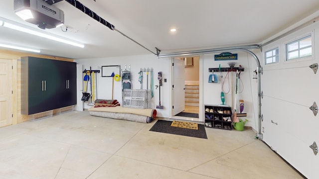 132 Mineral Spring Rd Unit 1, Windham, ME 04062 - garage featuring a garage door opener