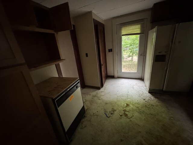 95 Eastern Ave, Augusta, ME 04330 - kitchen with white fridge with ice dispenser and baseboards