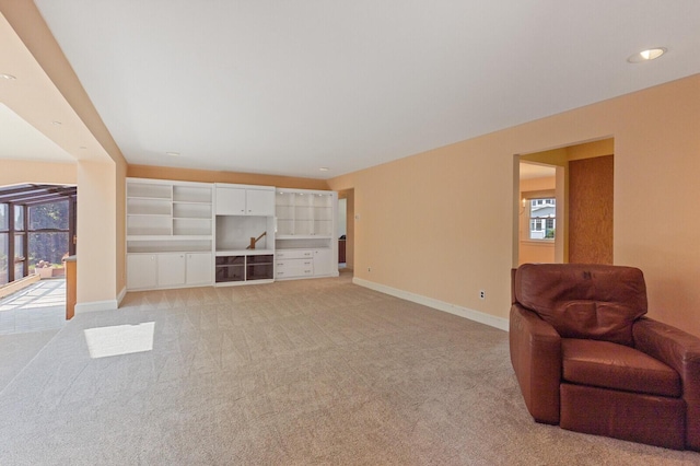 24 High St, Hallowell, ME 04347 - living area featuring healthy amount of natural light and light colored carpet