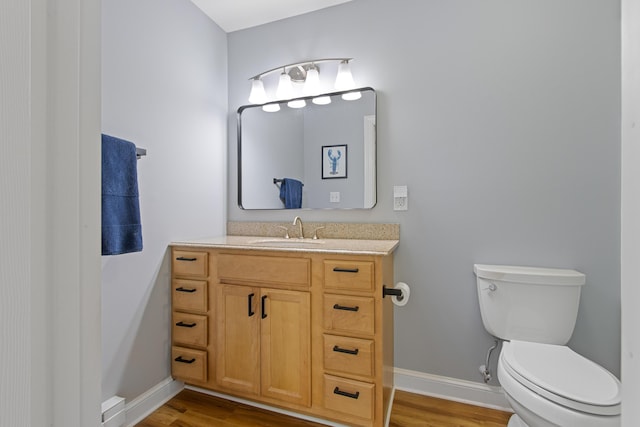 65 Pine Point Rd Unit 7, Scarborough, ME 04074 - bathroom featuring vanity and wood finished floors