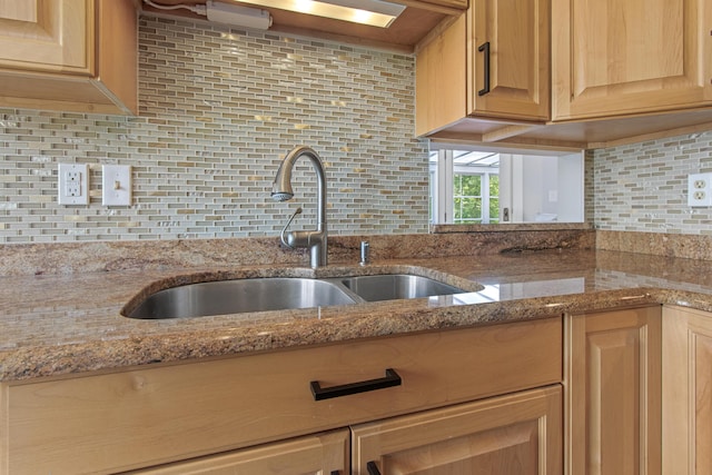 65 Pine Point Rd Unit 7, Scarborough, ME 04074 - kitchen with decorative backsplash, light brown cabinets, and light stone countertops