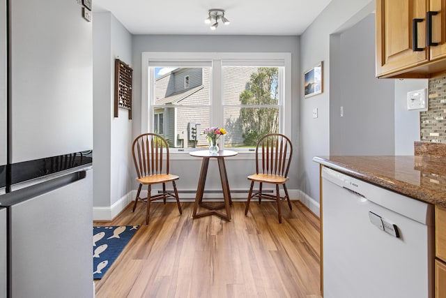 65 Pine Point Rd Unit 7, Scarborough, ME 04074 - living area with light wood-style flooring and baseboard heating