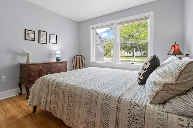 65 Pine Point Rd Unit 7, Scarborough, ME 04074 - bedroom featuring wood finished floors and baseboards