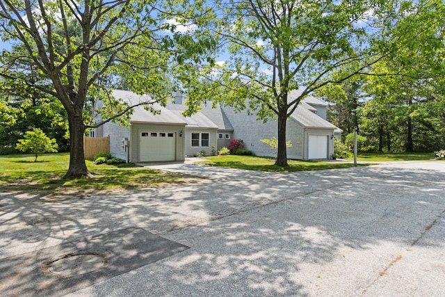 65 Pine Point Rd Unit 7, Scarborough, ME 04074 - view of front of property featuring an attached garage and concrete driveway
