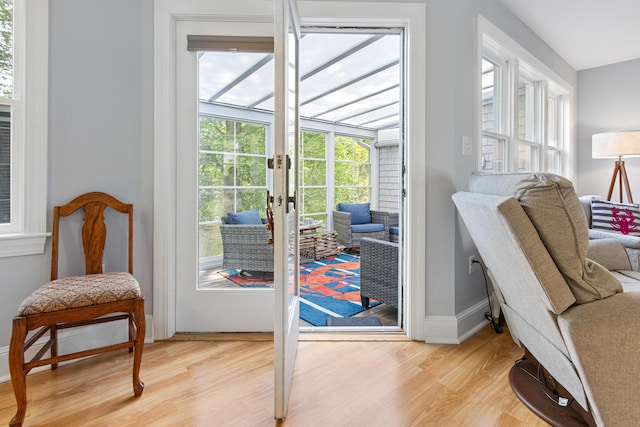 65 Pine Point Rd Unit 7, Scarborough, ME 04074 - doorway to outside featuring light wood-type flooring and french doors