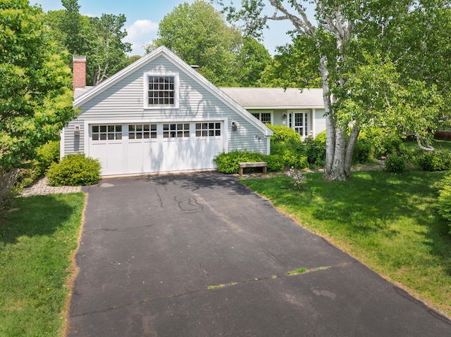 8 Broad Cove Rd, Cape Elizabeth, ME 04107 - view of front of property with a garage, a front lawn, and a chimney