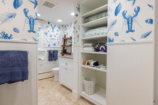 8 Broad Cove Rd, Cape Elizabeth, ME 04107 - bathroom with a baseboard heating unit, a wainscoted wall, and vanity