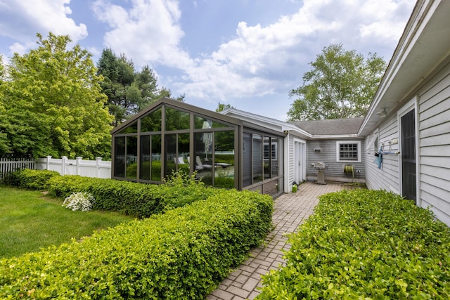 8 Broad Cove Rd, Cape Elizabeth, ME 04107 - back of property with a sunroom and a patio