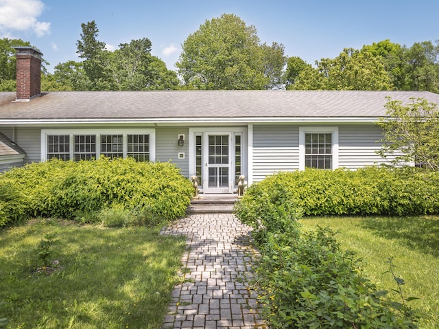 8 Broad Cove Rd, Cape Elizabeth, ME 04107 - view of front of house with a chimney and a front yard
