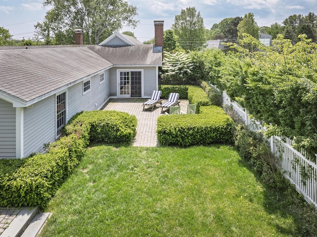 8 Broad Cove Rd, Cape Elizabeth, ME 04107 - rear view of property with a chimney, a fenced backyard, and a patio