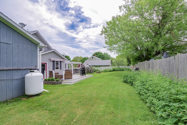 16 Lawn Ave, Rockland, ME 04841 - fenced backyard featuring a deck