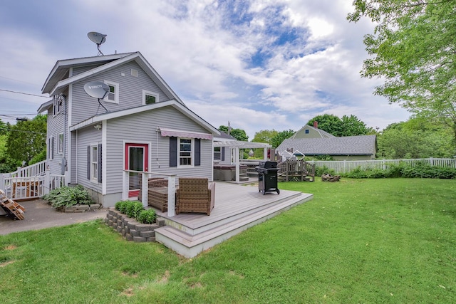 16 Lawn Ave, Rockland, ME 04841 - back of house with a wooden deck and a fenced backyard