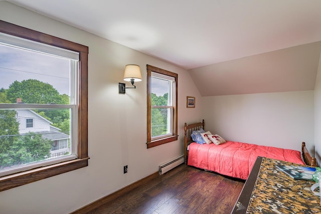 16 Lawn Ave, Rockland, ME 04841 - bedroom with a baseboard heating unit, dark wood-type flooring, and lofted ceiling