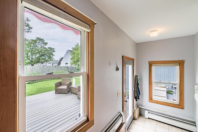 16 Lawn Ave, Rockland, ME 04841 - doorway to outside with a baseboard heating unit and light tile patterned flooring
