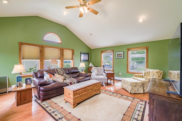16 Lawn Ave, Rockland, ME 04841 - living room with a ceiling fan, vaulted ceiling, a baseboard radiator, wood finished floors, and baseboard heating