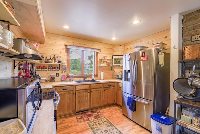 16 Lawn Ave, Rockland, ME 04841 - kitchen featuring appliances with stainless steel finishes, open shelves, light wood-style floors, brown cabinets, and recessed lighting