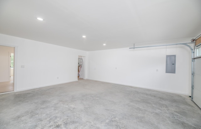 6 Walker Rd, Embden, ME 04958 - garage with electric panel and recessed lighting