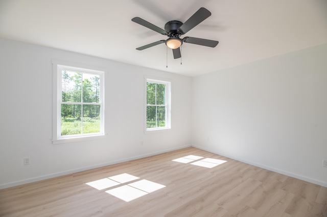6 Walker Rd, Embden, ME 04958 - spare room featuring plenty of natural light, light wood-type flooring, and baseboards