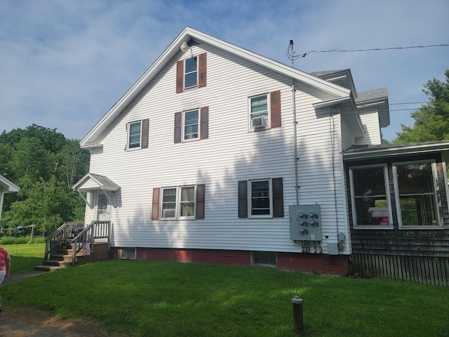 185 Elm St, Brewer, ME 04412 - rear view of house with a lawn