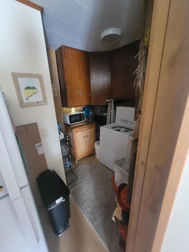 185 Elm St, Brewer, ME 04412 - kitchen with washer / clothes dryer and concrete flooring
