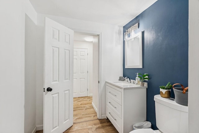 15 Bernard Ave, Biddeford, ME 04005 - bathroom featuring vanity, wood finished floors, and toilet
