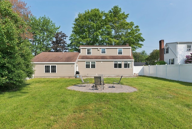 15 Bernard Ave, Biddeford, ME 04005 - rear view of house with a patio