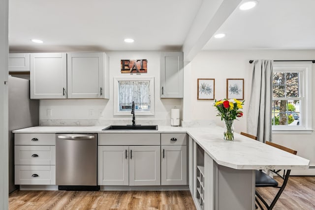 15 Bernard Ave, Biddeford, ME 04005 - kitchen featuring stainless steel dishwasher, a sink, a peninsula, gray cabinetry, and recessed lighting
