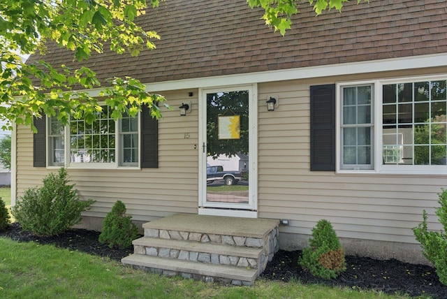 15 Bernard Ave, Biddeford, ME 04005 - doorway to property with roof with shingles