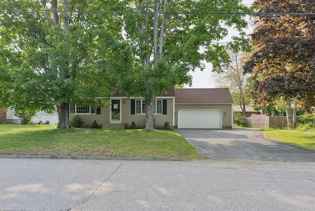 15 Bernard Ave, Biddeford, ME 04005 - view of front of home with asphalt driveway and a garage
