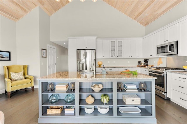 48 Ocean St, Belfast, ME 04915 - kitchen with appliances with stainless steel finishes, open shelves, wooden ceiling, white cabinetry, and a center island with sink