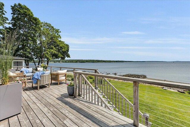48 Ocean St, Belfast, ME 04915 - wooden deck with a water view, an outdoor living space, and a yard