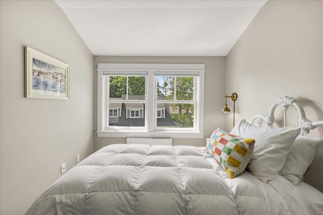 48 Ocean St, Belfast, ME 04915 - bedroom with radiator heating unit and lofted ceiling